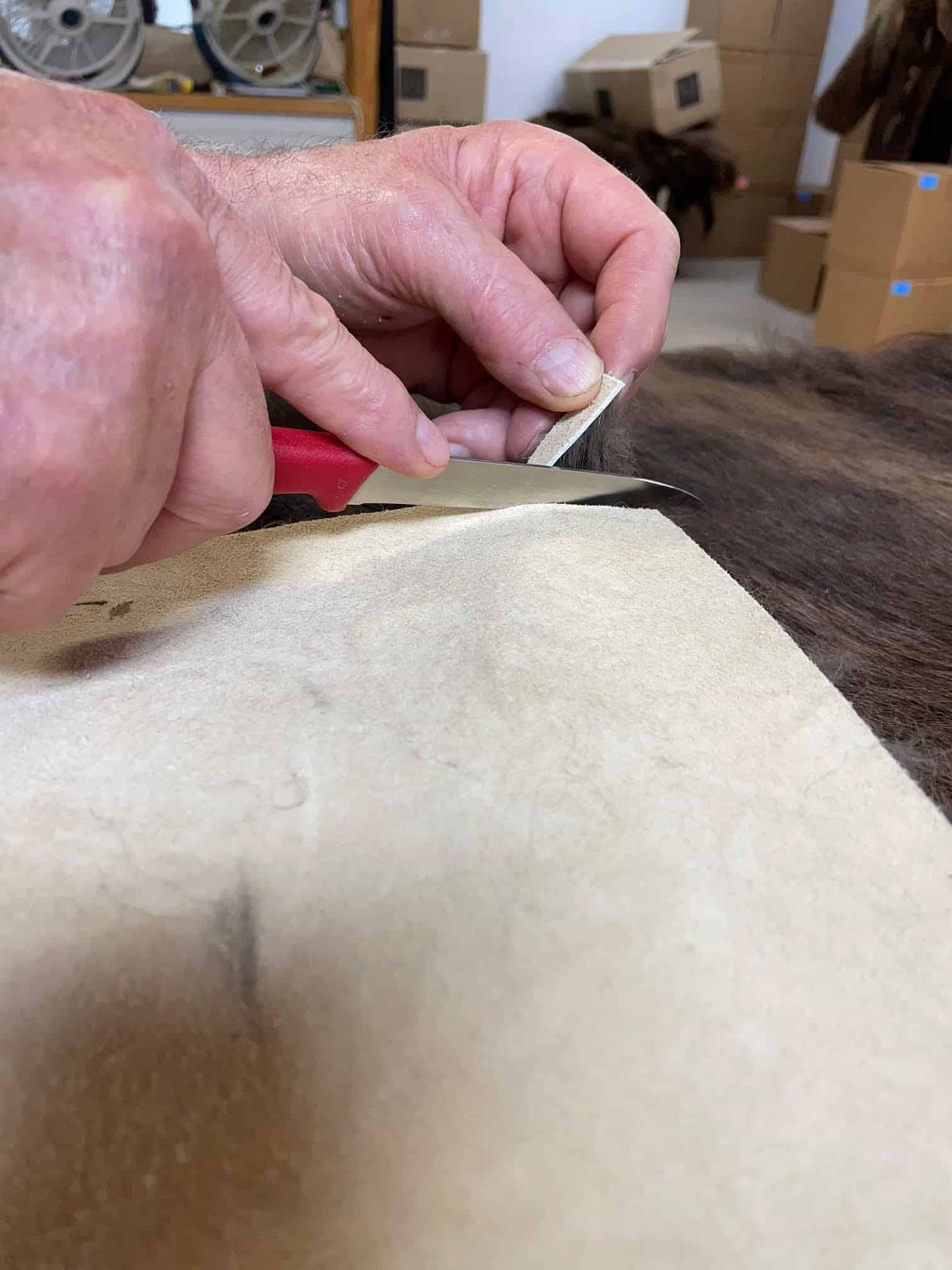 hand trimming buffalo fur rug